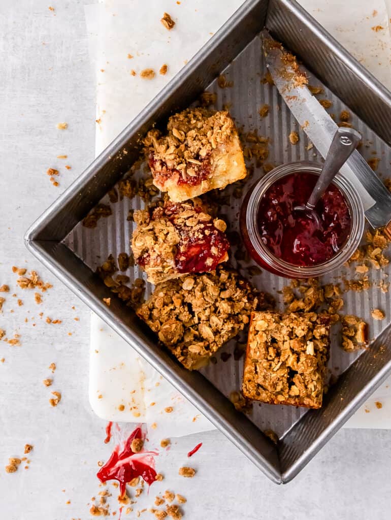 strawberry crumble bars in the pan