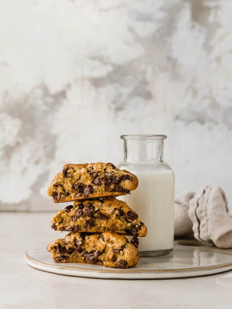 giant chocolate chip cookies made with tahini, brown butter, and halva. a fun twist on the classic inspired by levain bakery.