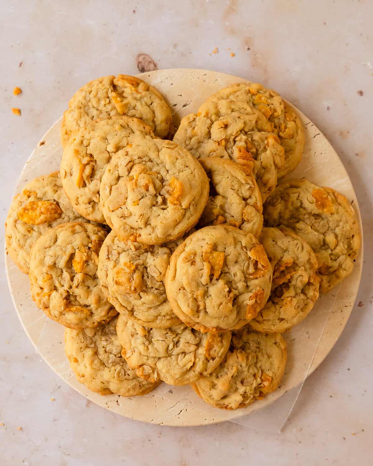 Cornflake cookies are thick and buttery cookies filled with old fashioned oats and cornflakes. These cookies with corn flakes have crisp edges and chewy centers. This cornflake cookie recipe easy to make, bake and enjoy in under an hour.