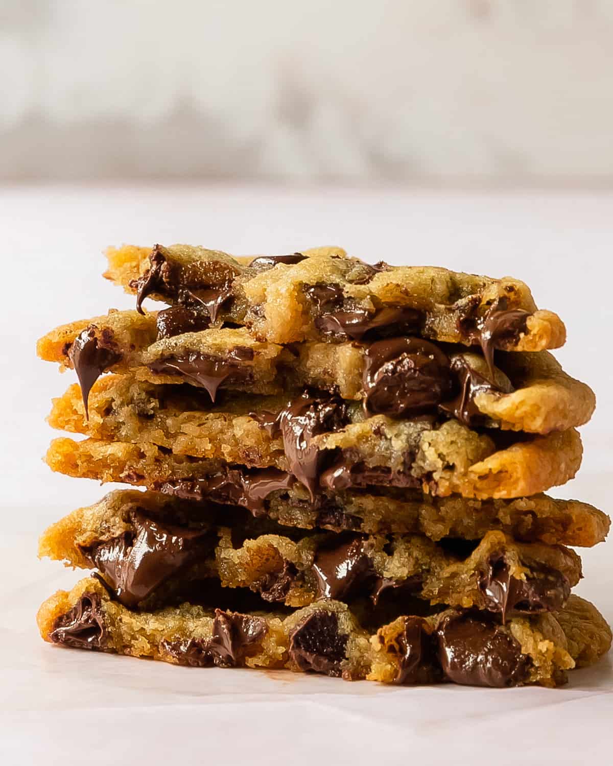These eggless chocolate chip cookies have crisp, buttery edges with soft, chewy centers and tons of melty chocolate chips. This recipe for eggless cookies uses all the same ingredients of  classic chocolate chip cookies just  with no eggs.  They are the best egg free chocolate chip cookie ever! 