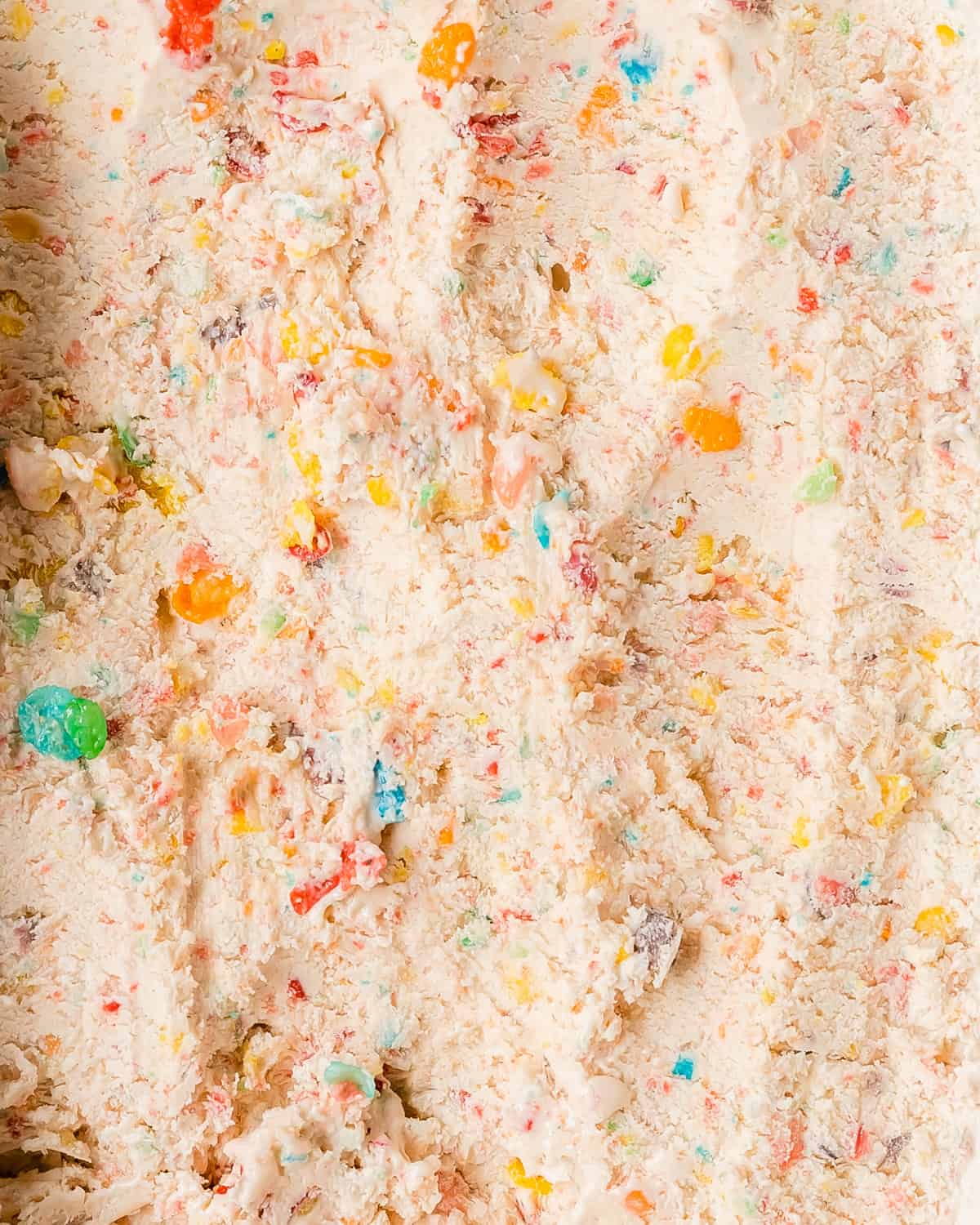 Fruity Pebbles ice cream is an easy and creamy, no churn cereal milk ice cream infused with fruity pebbles flavor.