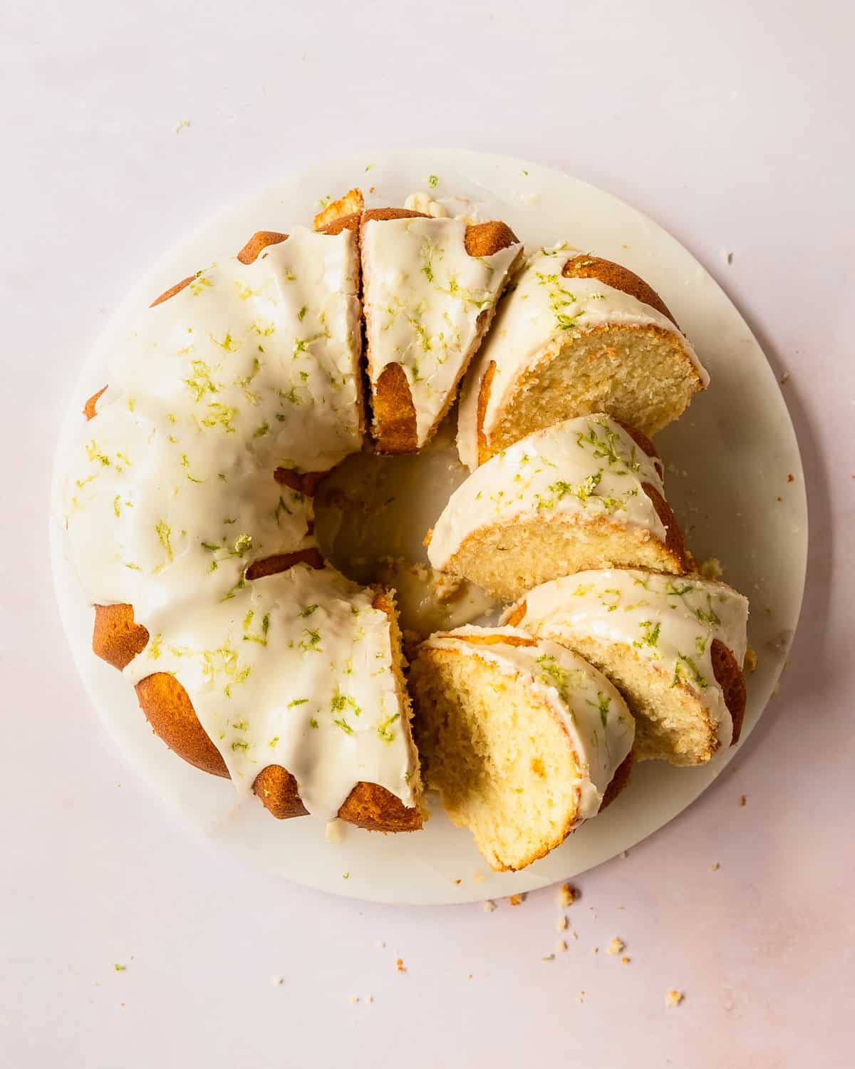 This key lime pound cake is a decadent, rich and buttery pound cake filled with key lime flavor. Top with this lime pound cake with a deliciously tart and sweet key lime glaze. Enjoy this easy to make, tropical twist on the classic southern pound cake for breakfast, brunch or dessert. 