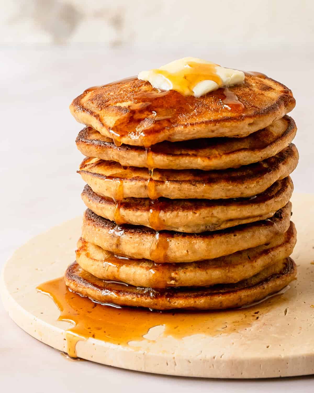 Oat flour pancakes are are so irresistibly light, fluffy and delicious, you’d never know they are also naturally gluten free. Learn how to make these quick and easy oatmeal flour pancakes using basic pantry ingredients. They make the perfect cozy breakfast everyone will love!