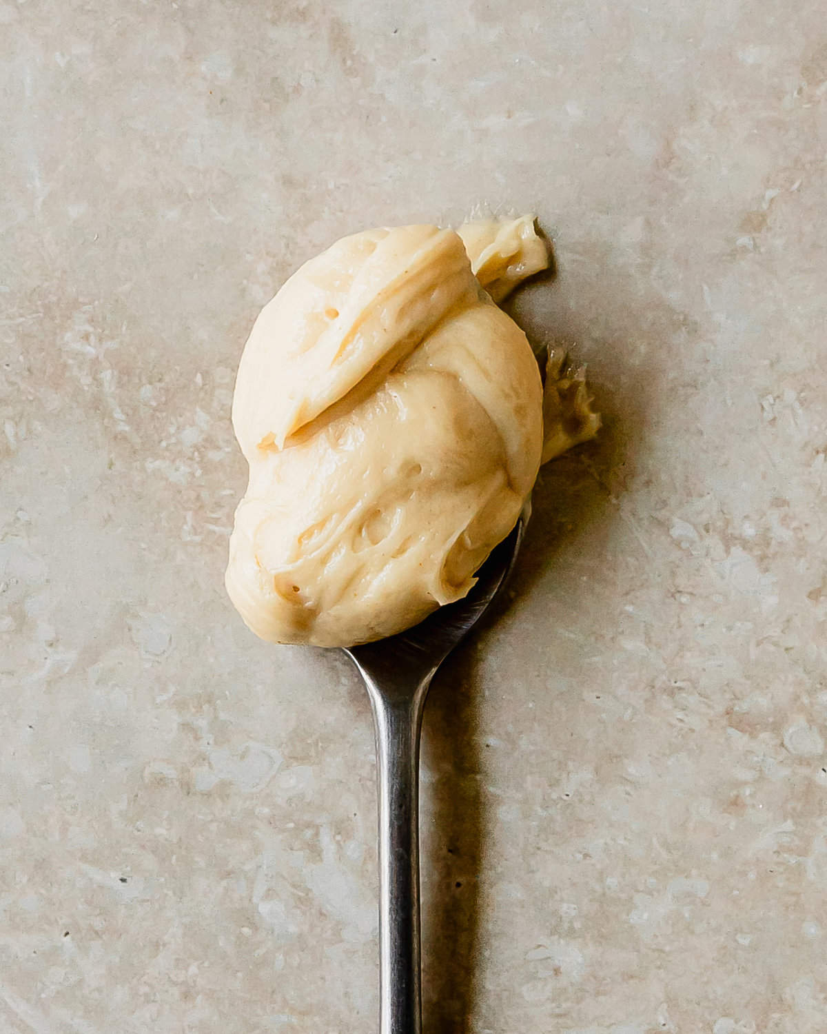 Peanut butter frosting is a rich, creamy, nutty and slightly tangy peanut butter icing. This peanut butter frosting with cream cheese is easy to make, using just a handful of ingredients. This recipe makes the perfect peanut butter frosting for cookies, cakes, cupcakes or to enjoy by the spoonful. 
