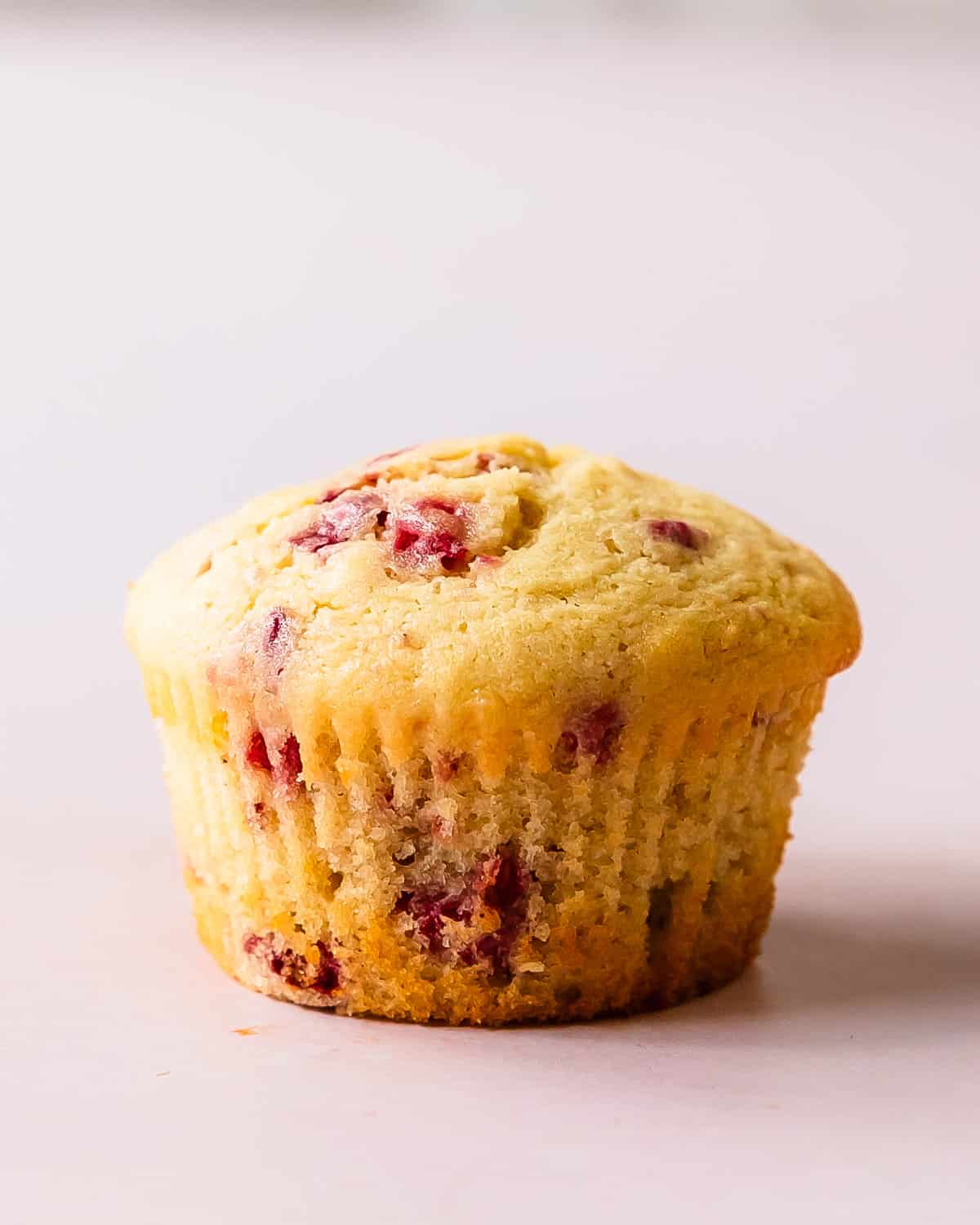 These raspberry muffins are light, fluffy and incredibly moist bakery style muffins filled with fresh or frozen raspberries and a hint of lemon. 