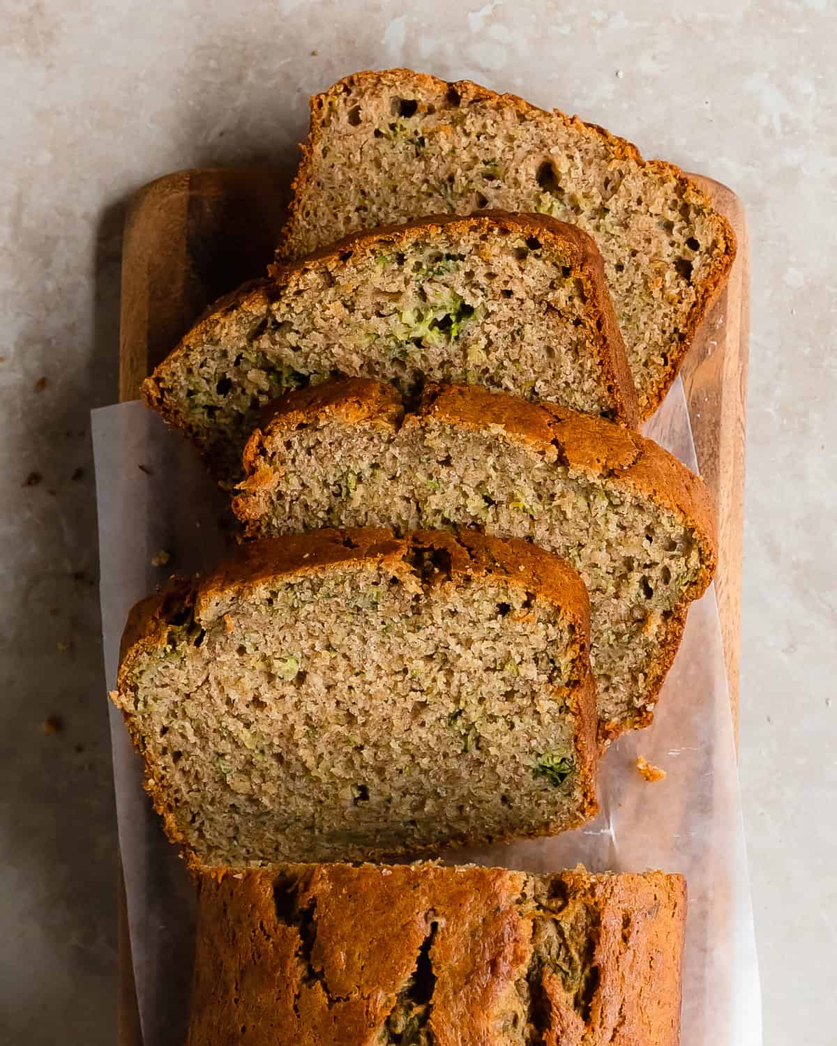Banana zucchini bread is a sweet and cozy, cinnamon spiced banana bread filled with shredded zucchini. This zucchini banana bread recipe is quick and easy to make and is the perfect breakfast or snack everyone will love. 