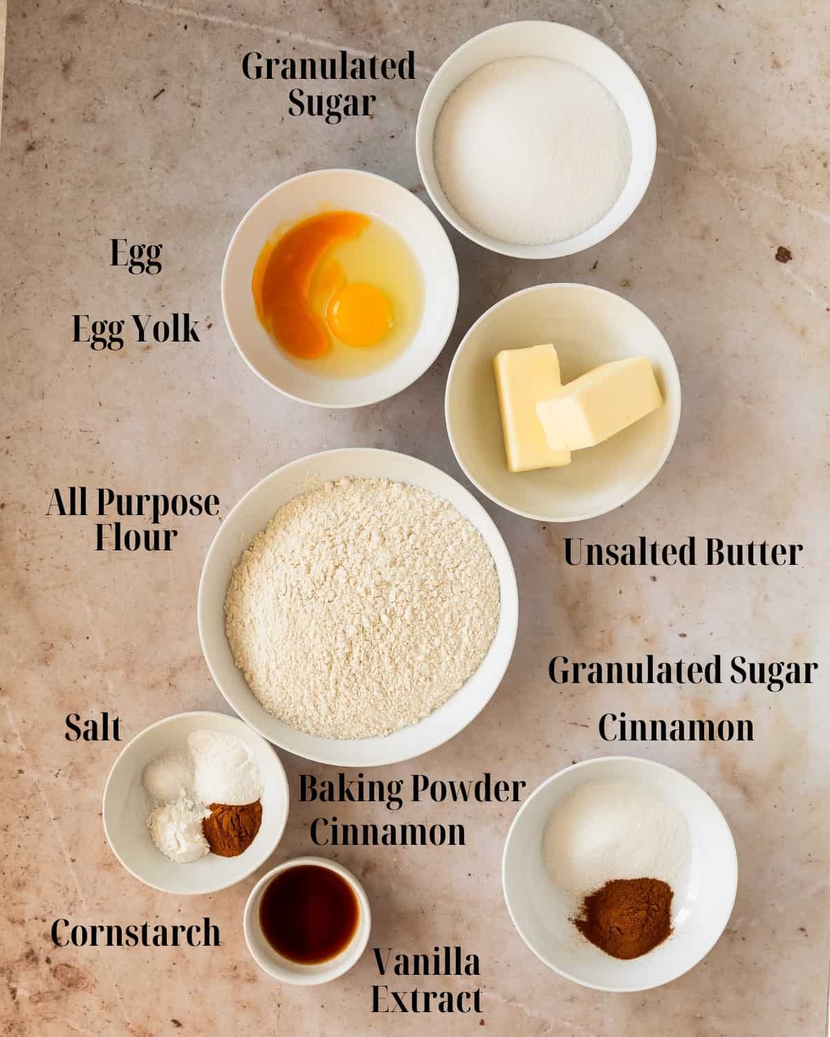 Sinckerdoodlewith no cream of tartar  ingredients: flour, baking powder, salt, cornstarch, ground cinnamon, butter, sugar, eggs and vanilla extract. 