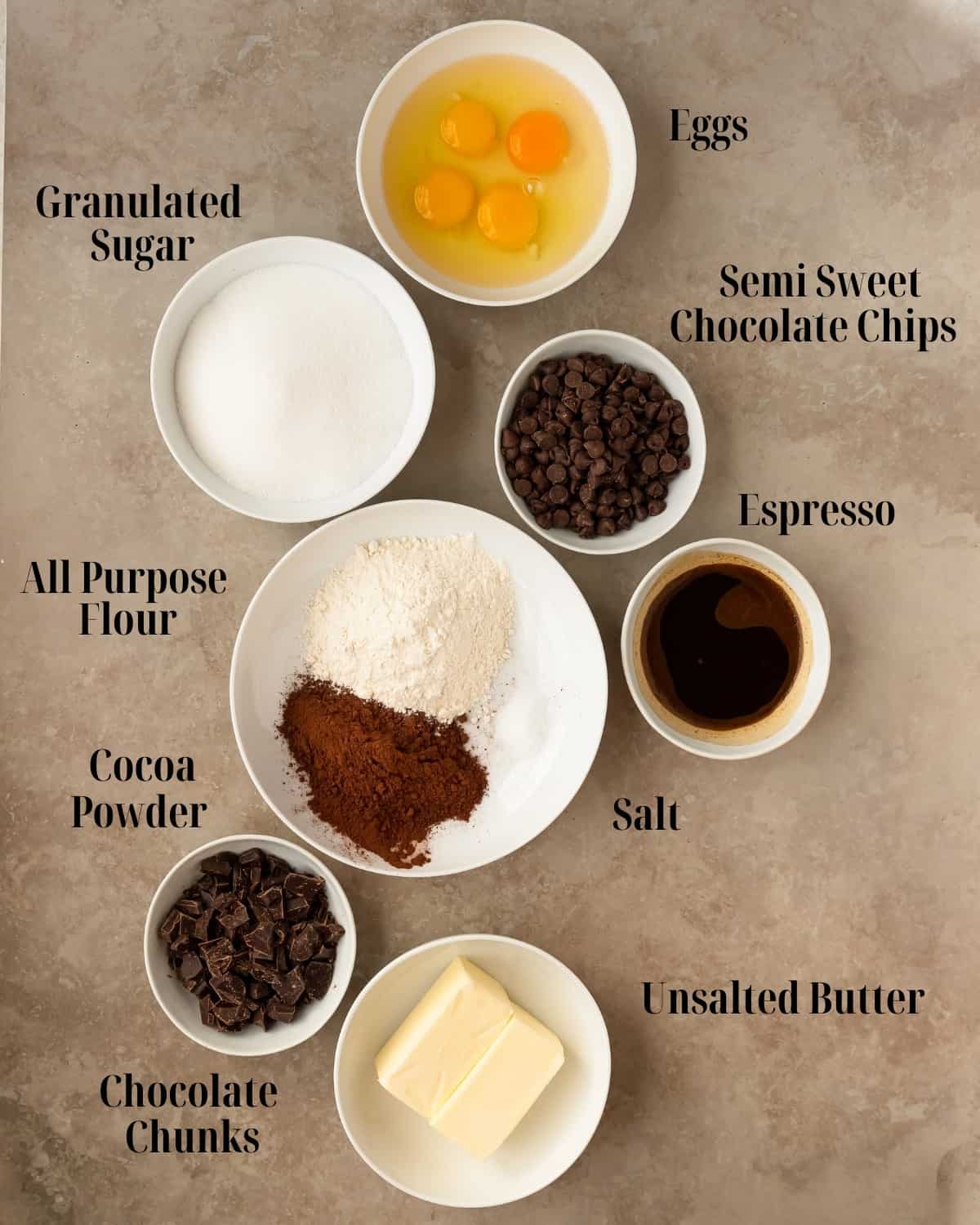 Espresso Brownie Ingredients: Butter, semi sweet chocolate chips, espresso, egges, sugar, cocoa powder, flour and dark chocolate chunks. 