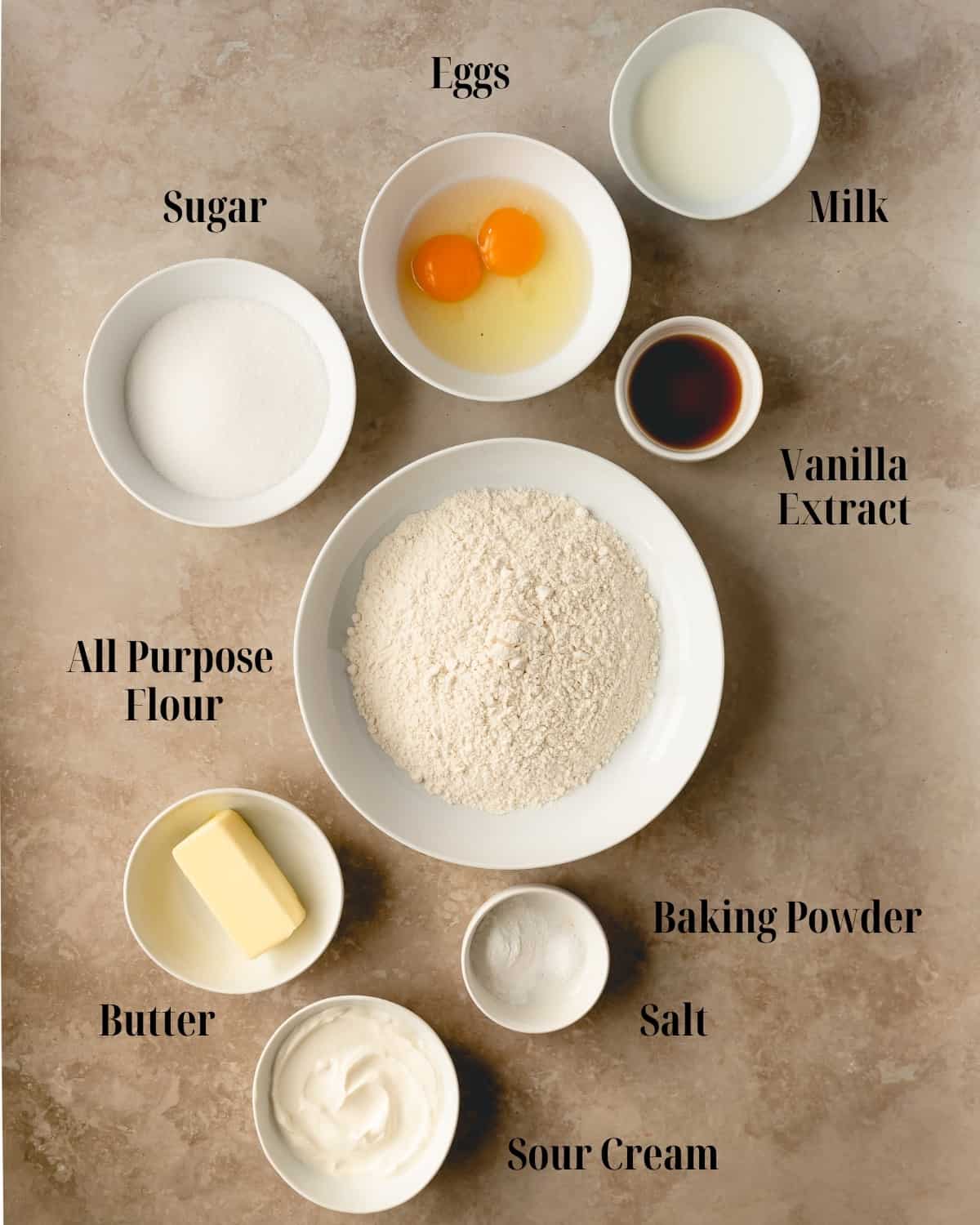Muffin ingredients in bowls. 