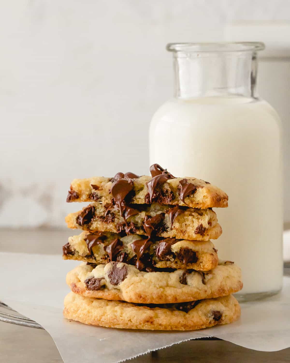 Chocolate Chip Cookies without Brown Sugar stacked on a plate.