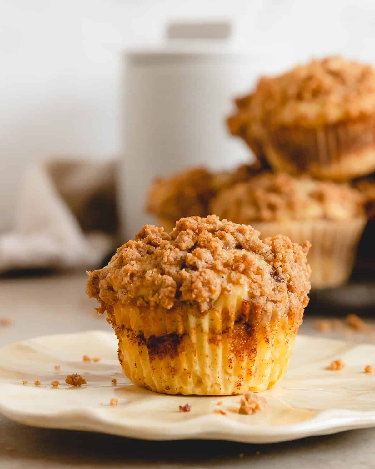 Cinnamon Streusel Muffin on a plate.