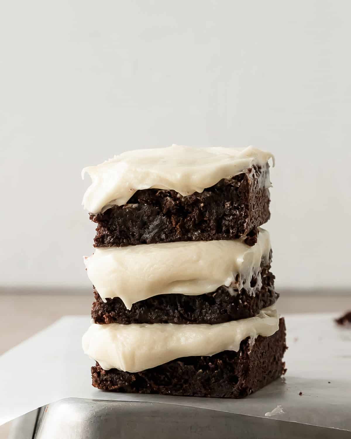 Brownies with Cream Cheese Frosting in a stack. 