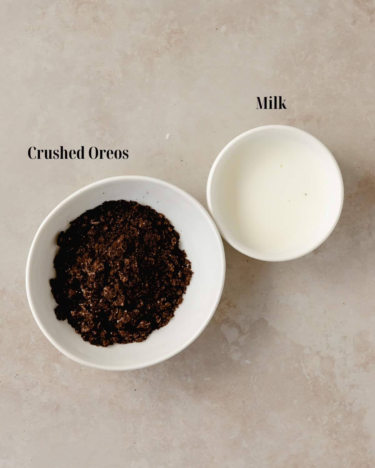 Gather crushed Oreo cookies and milk. 