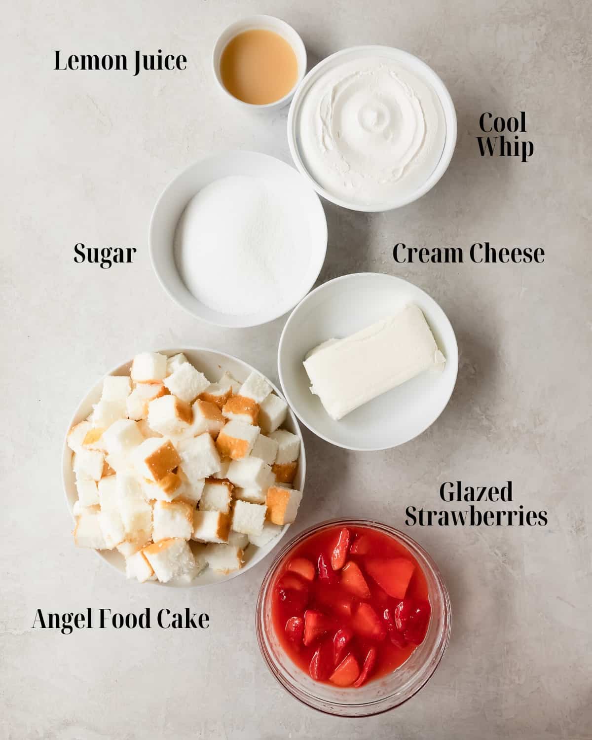 Strawberry Angel Food Cake Ingredients: Gather angel food cake, cream cheese, sugar, lemon juice, cool whip and the strawberry glaze. 