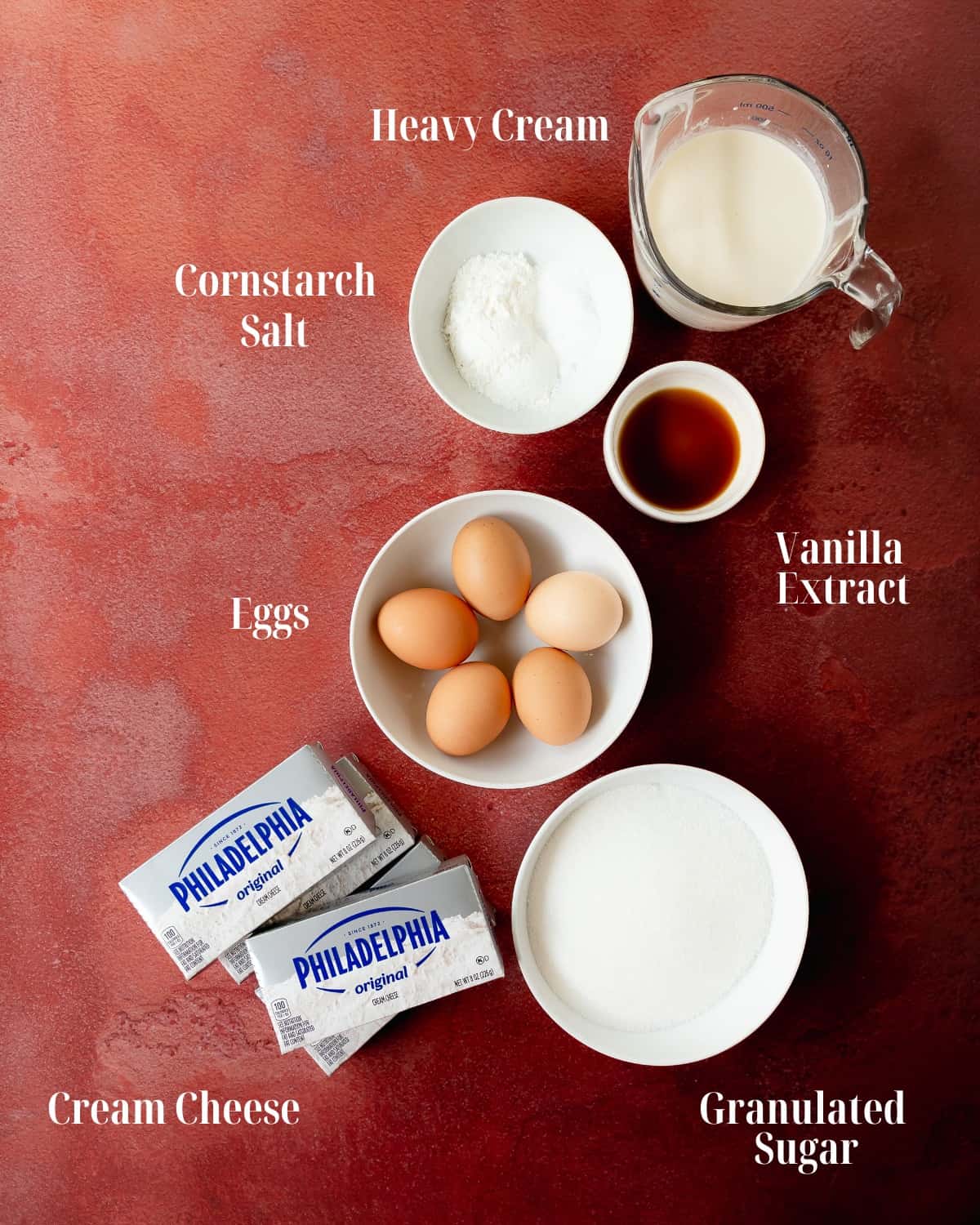 Ingredients:  Gather cream cheese, sugar, vanilla extract, salt, cornstarch, heavy cream and eggs.