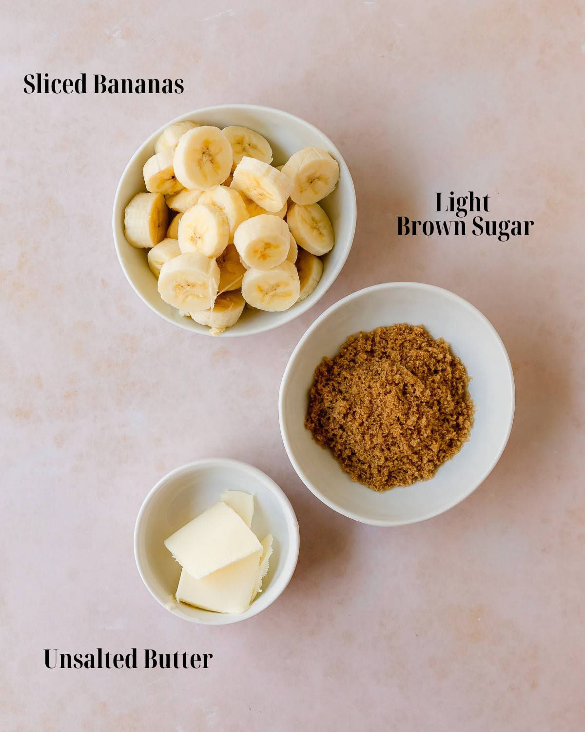 Gather a couple of firm bananas, butter and light brown sugar. 
