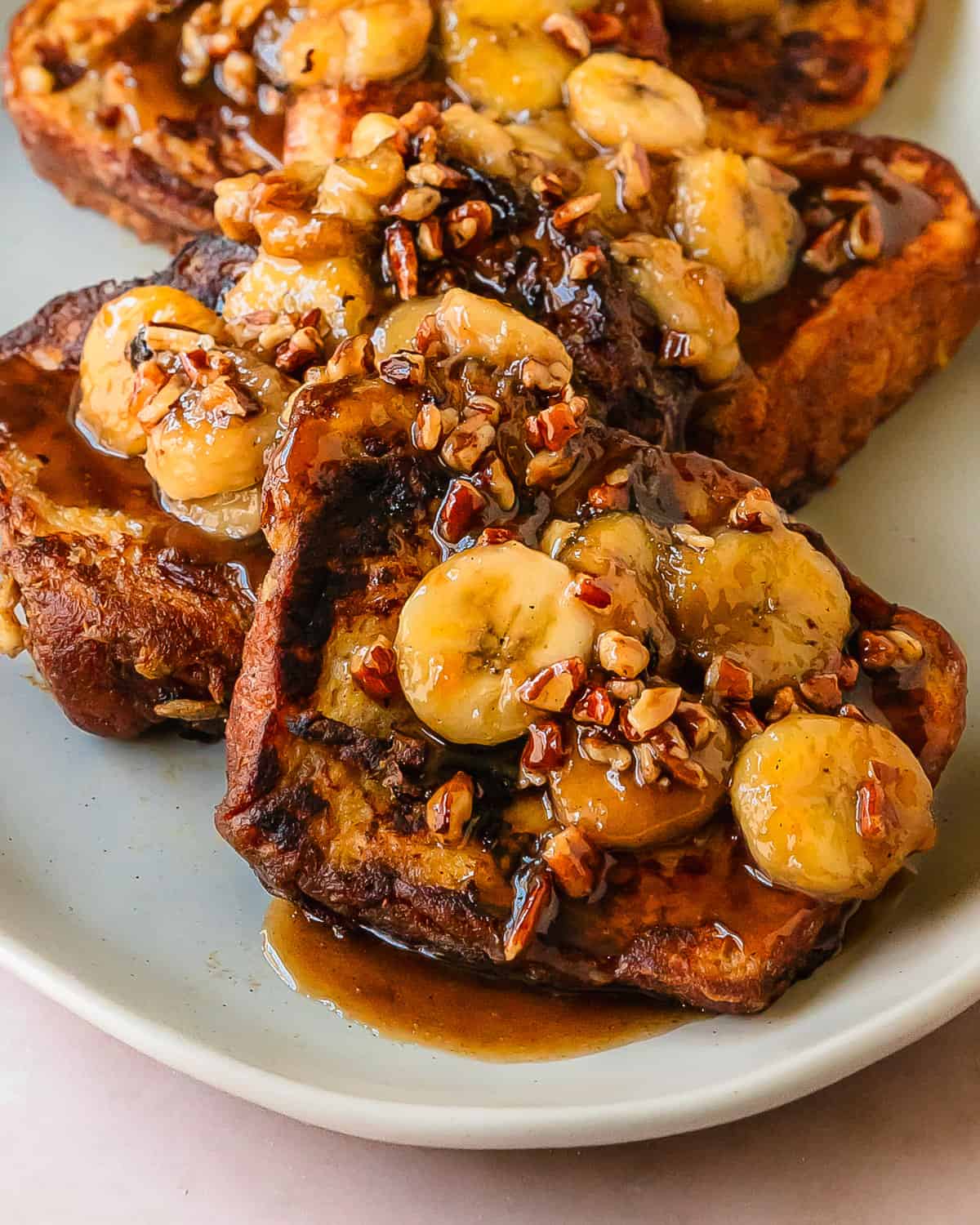  Banana french toast is a simple and decadent french toast made from buttery bread soaked in a rich banana custard, fried to golden perfection. It’s topped with caramelized bananas and chopped nuts. This quick and easy french toast with bananas makes the perfect indulgent breakfast or brunch.