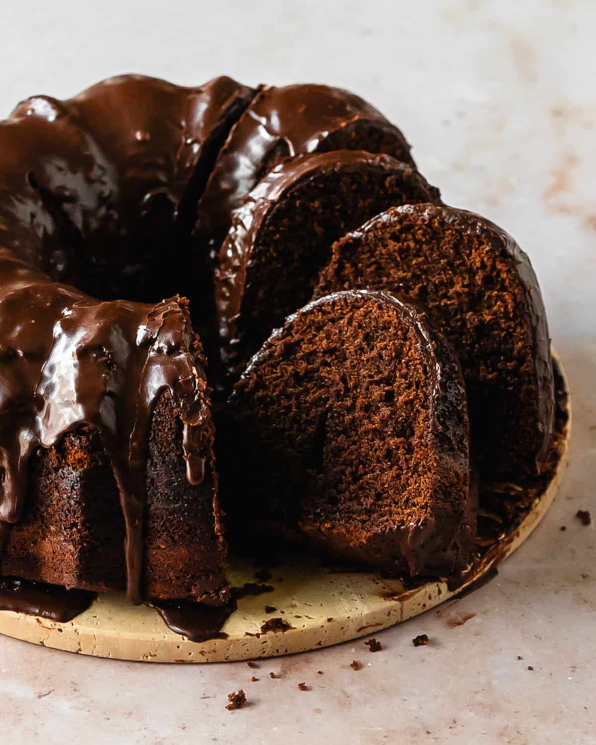 Chocolate pound cake is a moist and velvety old fashioned chocolate pound cake. Top with this chocolate bundt cake with a deliciously decadent chocolate glaze for even more rich chocolate flavor. This easy to make double chocolate pound cake makes the perfect simple and delicious dessert.