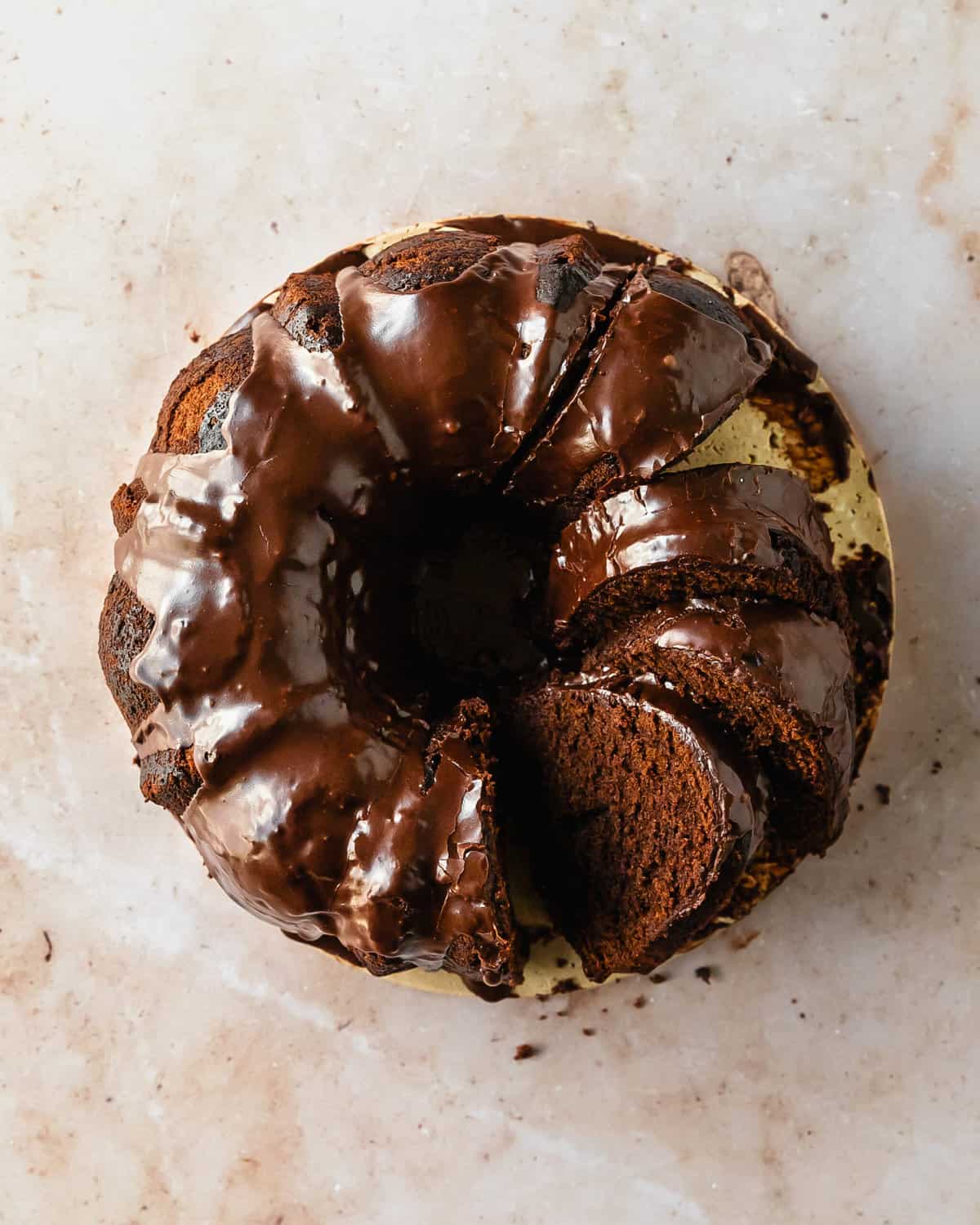 Chocolate pound cake is a moist and velvety old fashioned chocolate pound cake. Top with this chocolate bundt cake with a deliciously decadent chocolate glaze for even more rich chocolate flavor. This easy to make double chocolate pound cake makes the perfect simple and delicious dessert. 