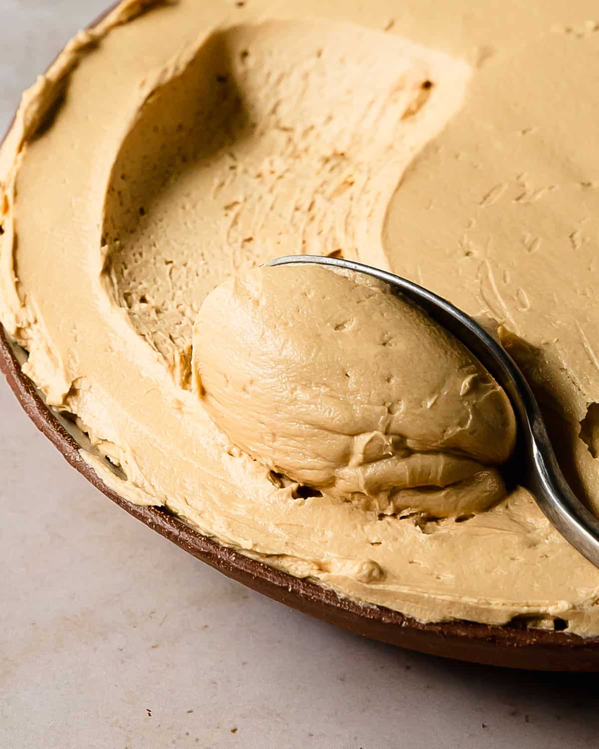 Coffee buttercream is a rich, sweet and creamy coffee flavored frosting that’s perfect for cakes, cupcakes or just to enjoy by the spoonful. Make this easy coffee frosting in about 5 minutes or less using 5 simple ingredients