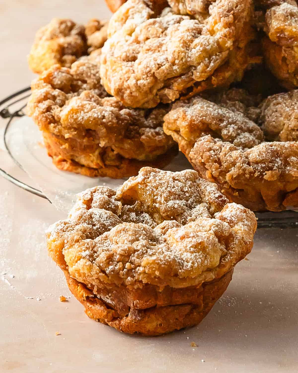 French toast muffins is a quick and easy french toast recipe baked in a muffin pan. These soft and buttery french toast cups are topped with a crunchy cinnamon streusel topping.  Once baked, these delicious cinnamon toast muffins can be topped with maple syrup, powdered sugar or enjoyed as is for a fun and tasty breakfast treat.