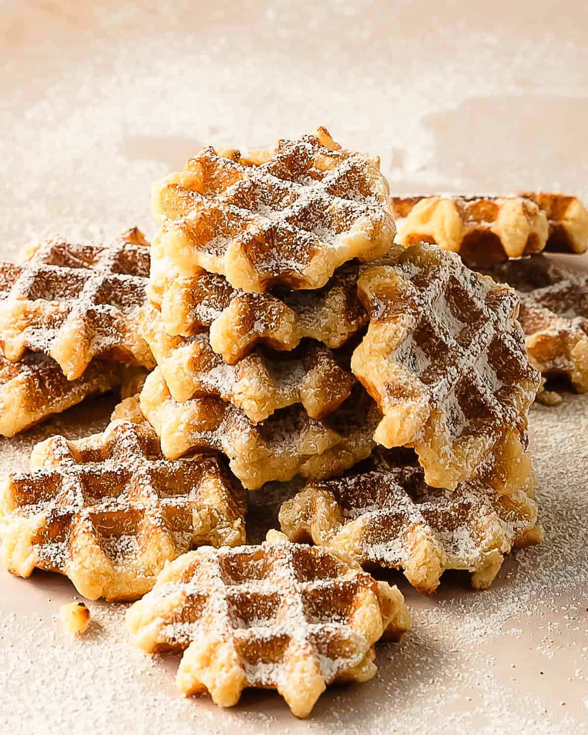 Waffle cookies area classic buttery vanilla sugar cookie cooked on a waffle iron. These easy cookie waffles have a soft buttery interior with a crisp golden brown exterior.