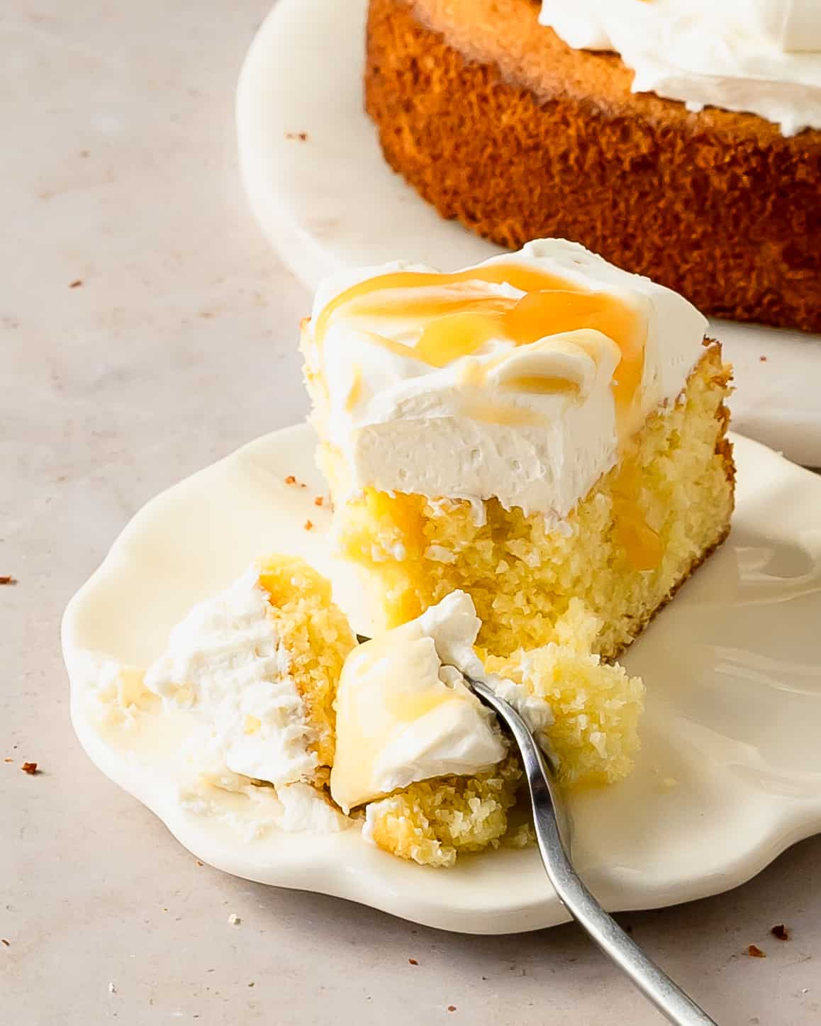  Limoncello mascarpone cake is a deliciously soft and tender lemon cake infused with limoncello liqueur flavor. This Italian lemon cake is topped with a rich and creamy mascarpone frosting and tart lemon curd. Make this limoncello cake anytime you need a simple, but stunning dessert.