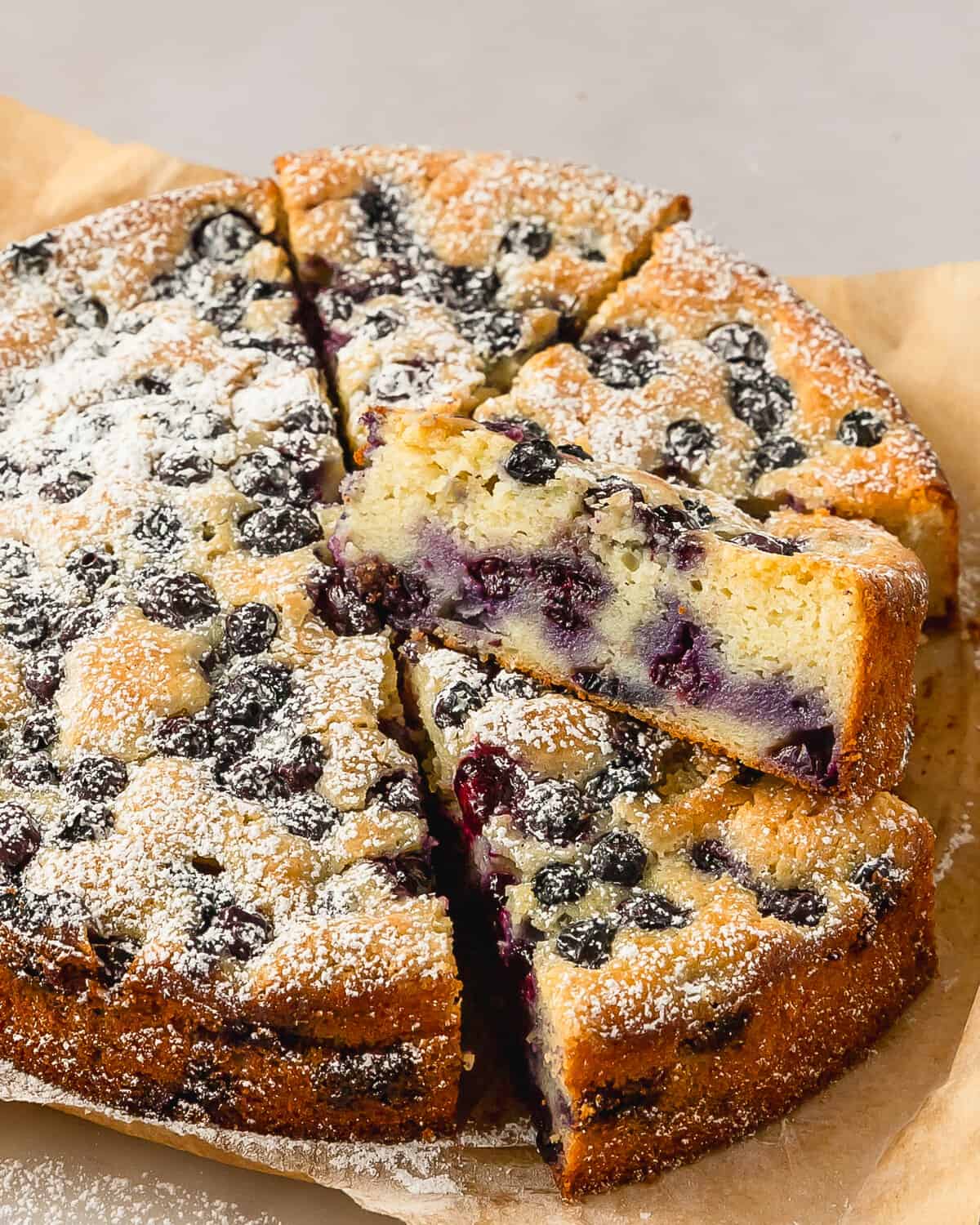 Blueberry ricotta cake is a deliciously sweet and moist Italian cake cake made with creamy ricotta and fresh blueberries. This easy to make blueberry lemon ricotta cake has a rich clafoutis like texture with a hint of bright lemon flavor. Make this ricotta blueberry cake for breakfast, dessert or anytime you need a simple, but stunning Italian cake.