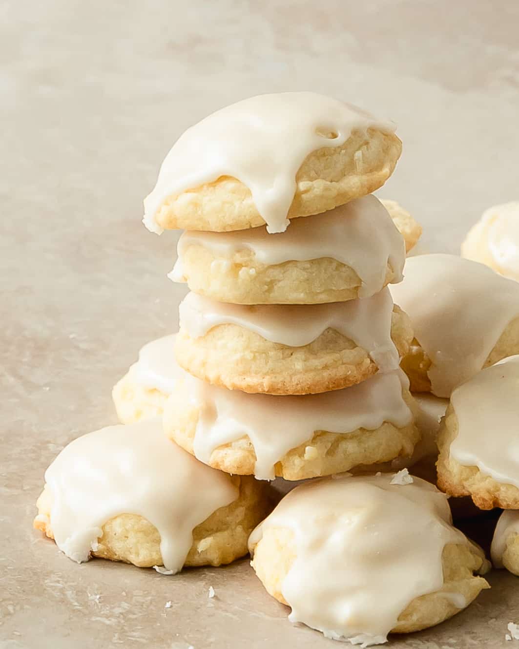 Lemon drop cookies are soft and buttery cookies filled with bright and fresh lemon flavor. Enjoy these bite sized Italian lemon cookies plain or with a sweet and tart lemon glaze. Make these wonderfully refreshing and beautifully fragrant glazed lemon cookies for a taste of spring and summer all year long. 