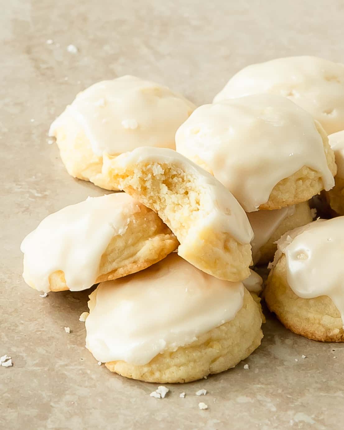 Lemon drop cookies are soft and buttery cookies filled with bright and fresh lemon flavor. Enjoy these bite sized Italian lemon cookies plain or with a sweet and tart lemon glaze. Make these wonderfully refreshing and beautifully fragrant glazed lemon cookies for a taste of spring and summer all year long.