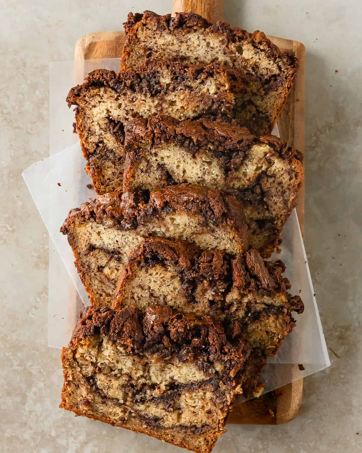 Nutella banana bread is a soft and wonderfully moist banana bread with thick ribbons of deeply rich Nutella swirled into every bite.  This banana bread and nutella recipe is quick, easy to make and is the perfect breakfast or dessert everyone will love. 