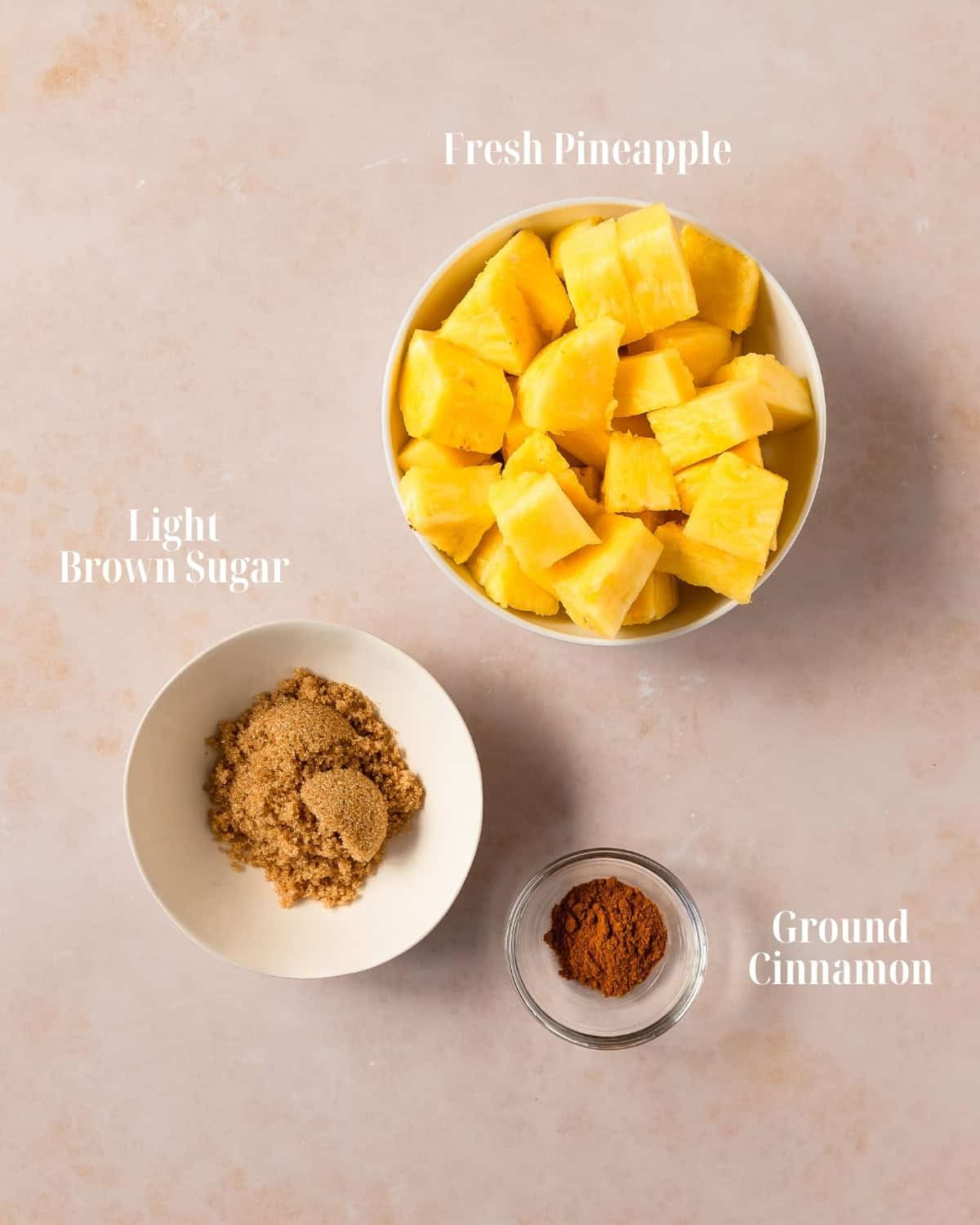 Gather fresh pineapple, light brown sugar and ground cinnamon.  