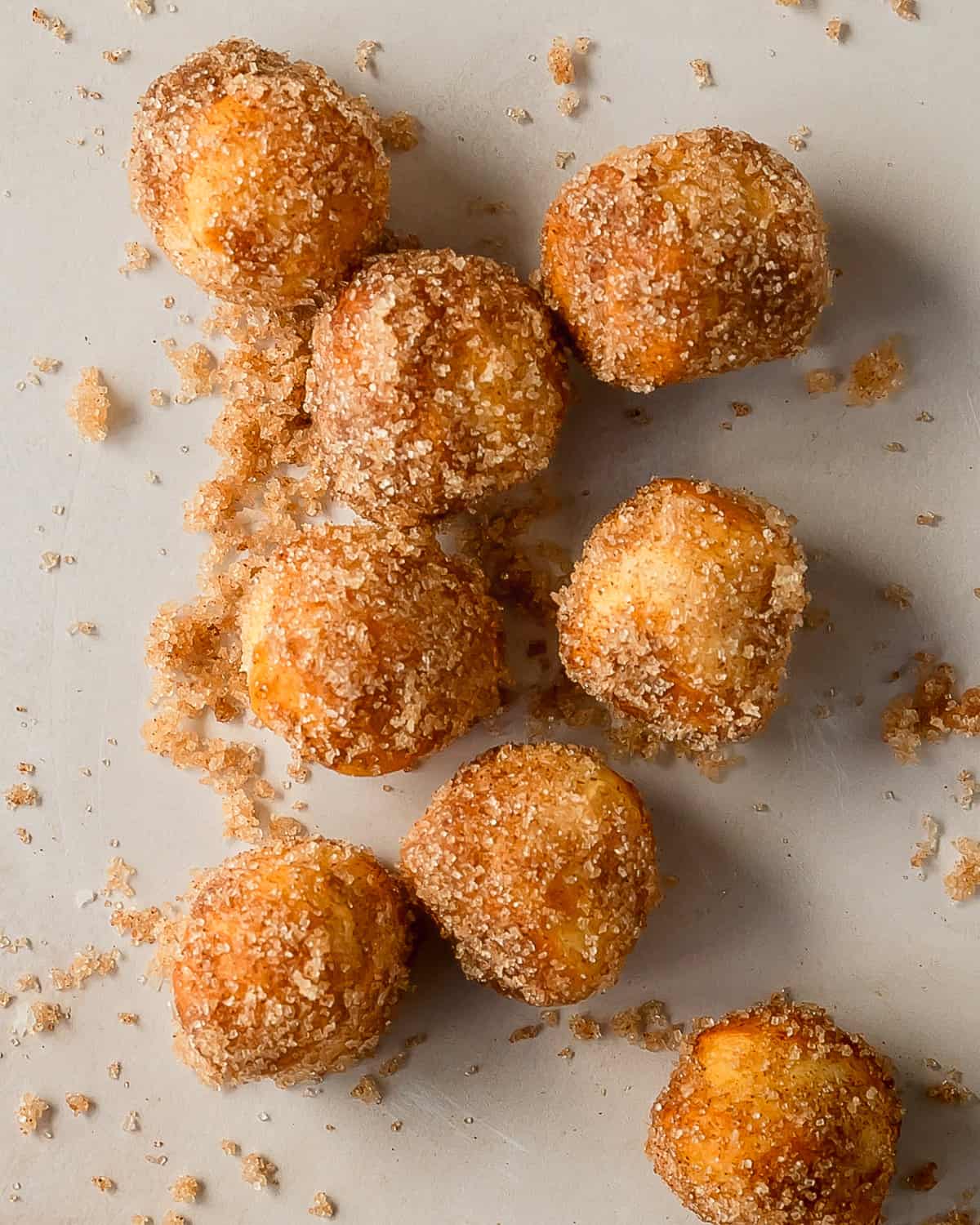Air fryer biscuit donuts are flaky and fluffy air fryer donuts made using store bought, refrigerated biscuit dough. These easy to make biscuit doughnuts are dipped in melted butter and covered in a sweet and crunchy cinnamon sugar coating. Prep and air fryer these cinnamon sugar biscuit donuts in under 10 minutes.