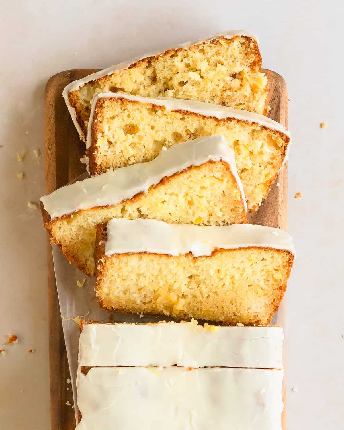 Pineapple bread is a soft, moist and buttery pineapple quick bread filled with crushed pineapple. This easy to make pineapple loaf cake is topped with a sweet pineapple glaze for even more fresh tropical flavor.