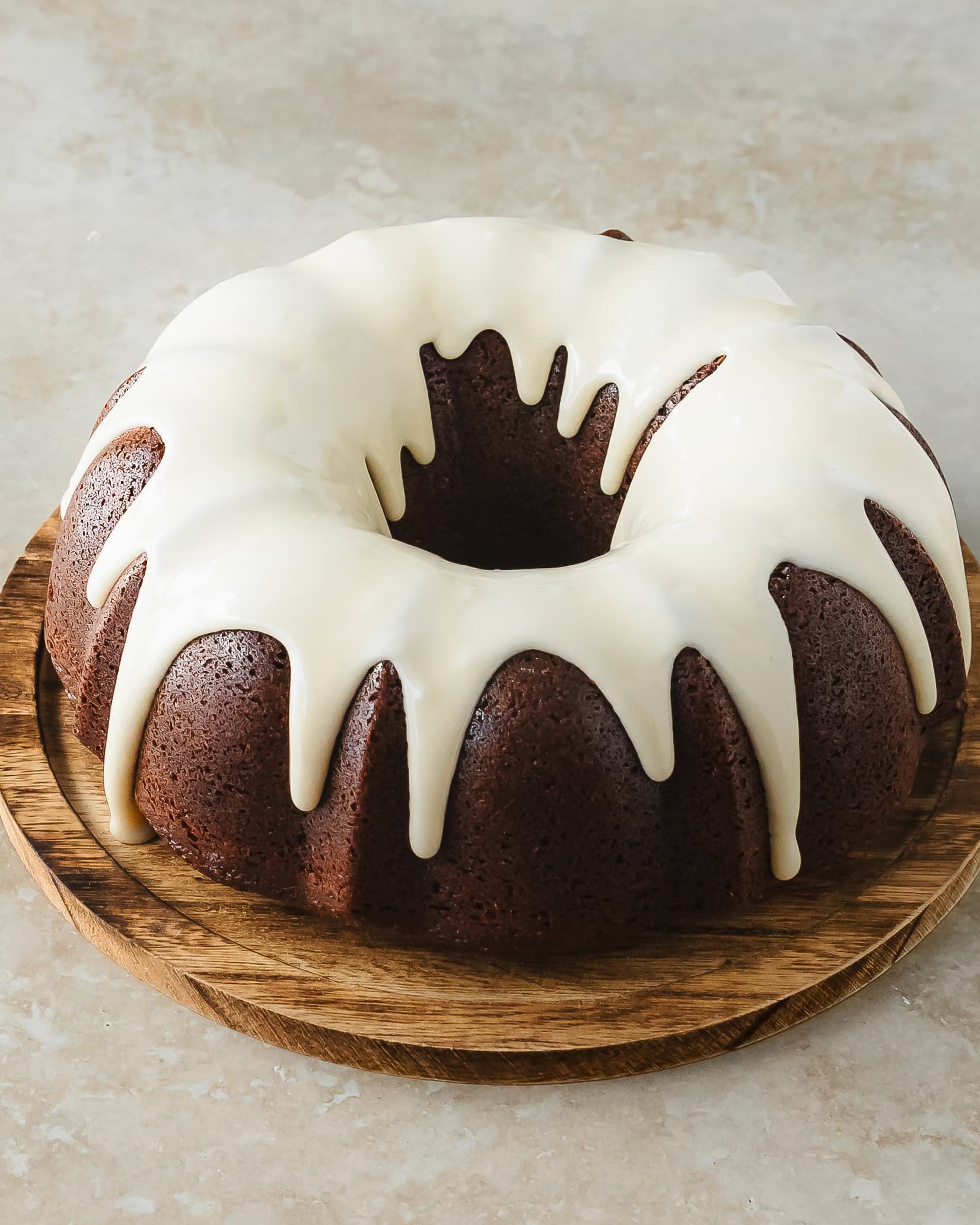 Gingerbread bundt cake is a wonderfully moist and tender gingerbread cake filled with molasses and lots of cozy warming spices. Top this perfectly spiced bundt cake with powdered sugar or a creamy glaze for the perfect easy to make, show stopping holiday cake everyone will love.