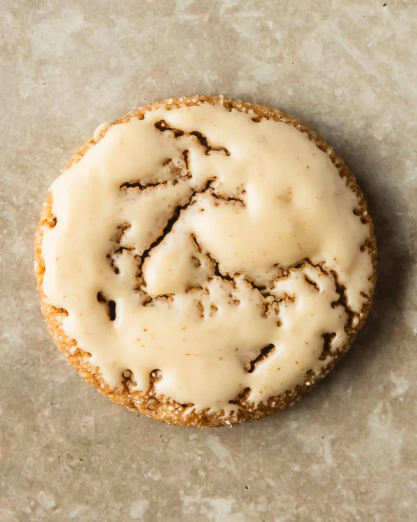 Close up shot of espresso icing gingerbread cookie.