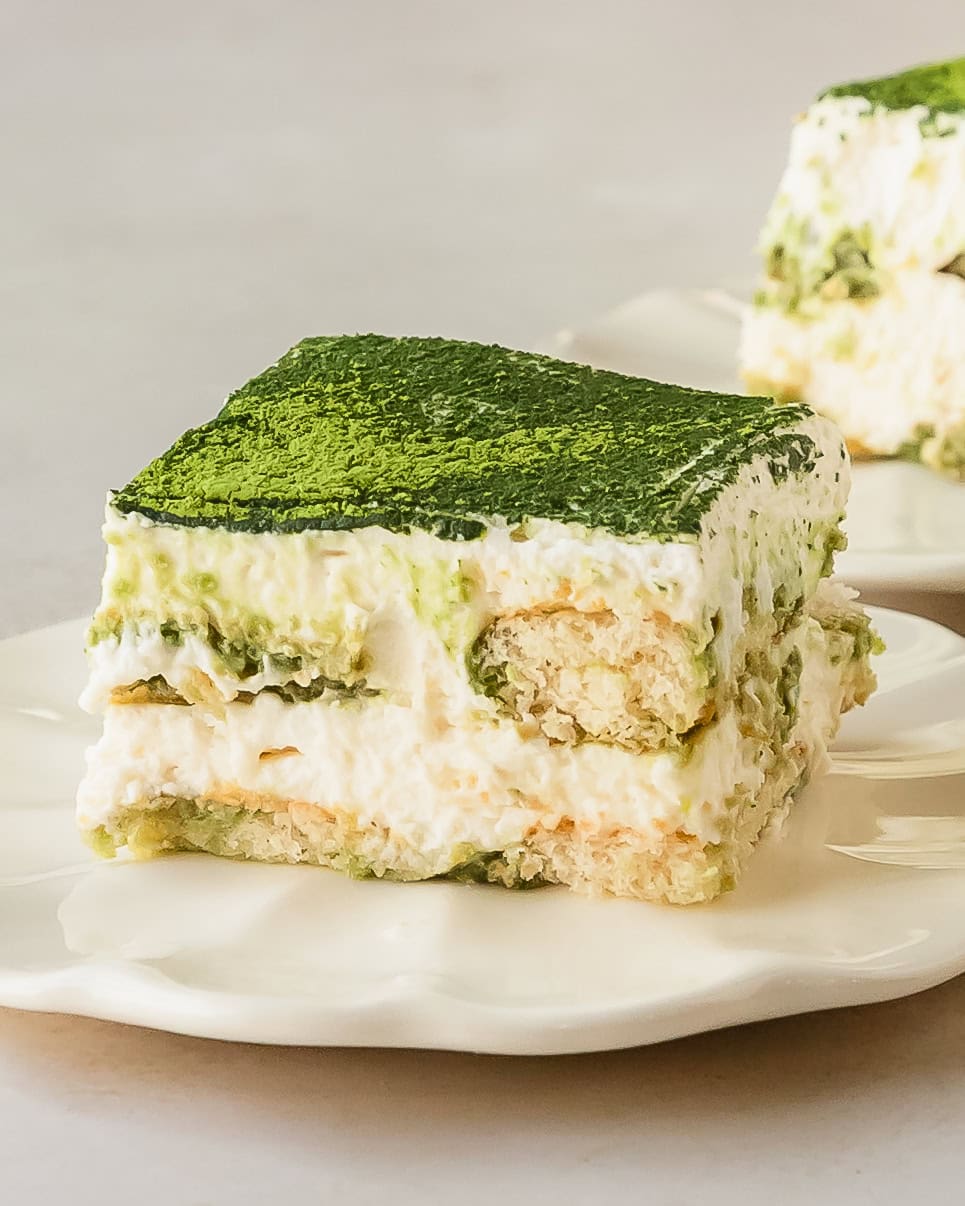 Matcha tiramisu is a decadent Asian-inspired twist on the classic Italian tiramisu dessert. Matcha tea tiramisu is made with layers of matcha tea soaked ladyfingers layered with a light and creamy mascarpone filling. This green tea tiramisu is the perfect easy to make and refreshing no bake dessert.