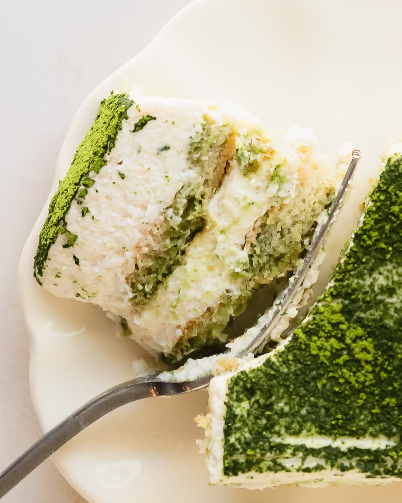 Matcha Tiramisu slices with fork.