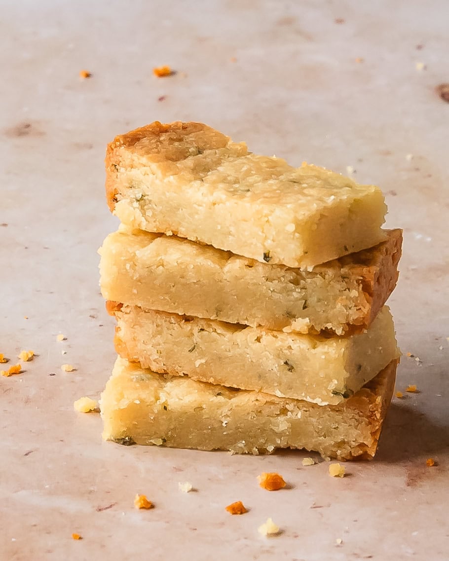 Shortbread Rosemary Bars stacked on top of each other.
