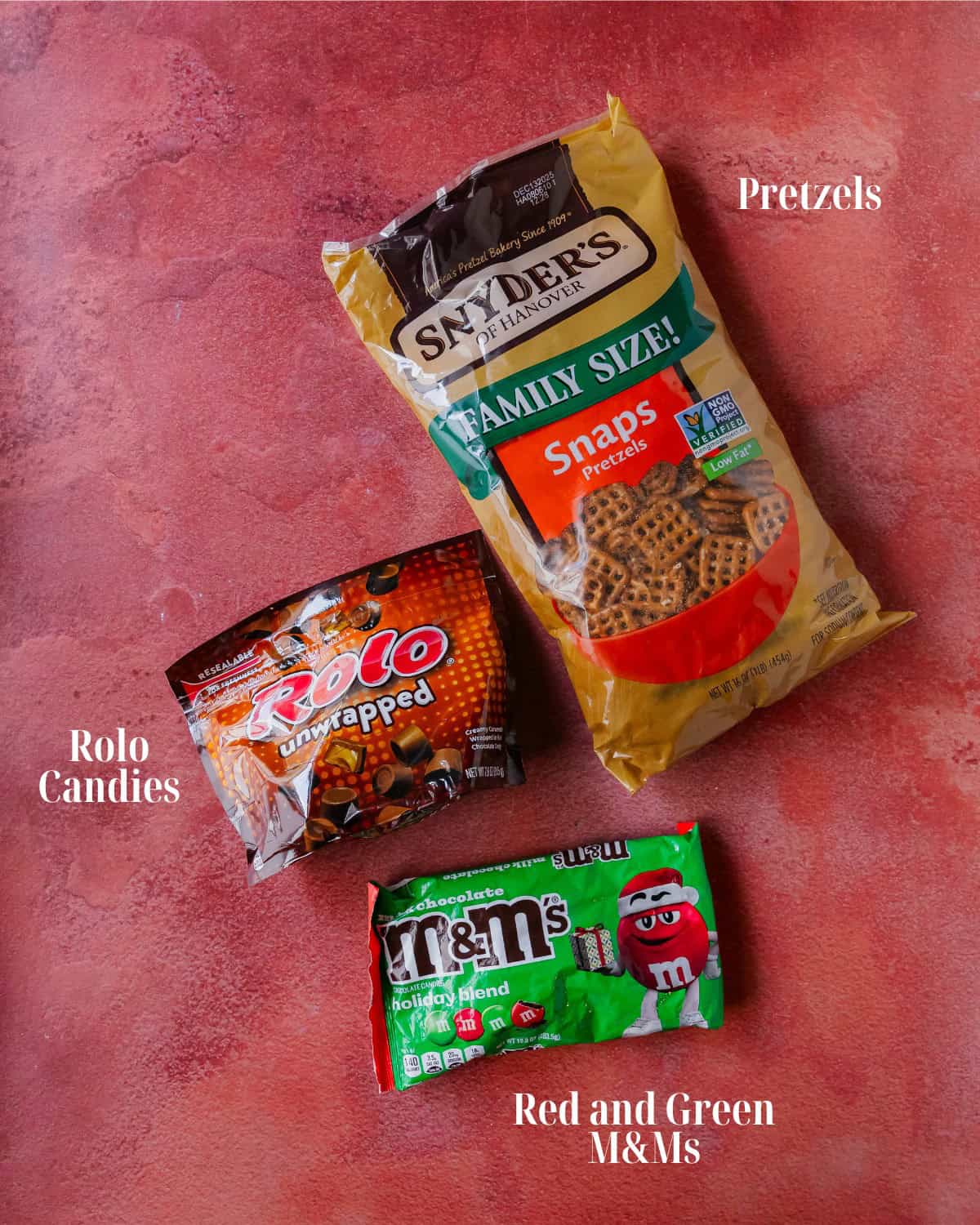 Gather small pretzels, Rolo candy and your choice of toppings such as holiday colored M&M’s or nuts.