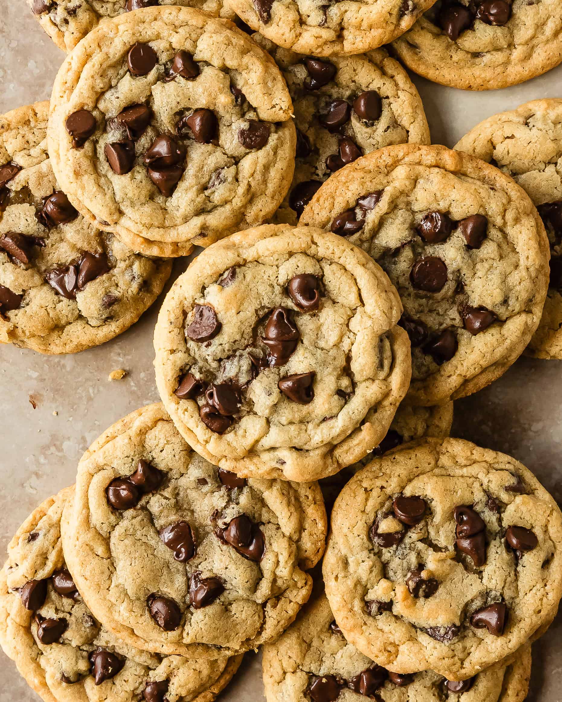The best chocolate chip cookies are perfectly buttery, soft and chewy with lots of melty, rich and gooey chocolate chips. This chocolate chip cookie recipe is easy to make with simple ingredients and makes the perfect, amazingly delicious chocolate chip cookie.