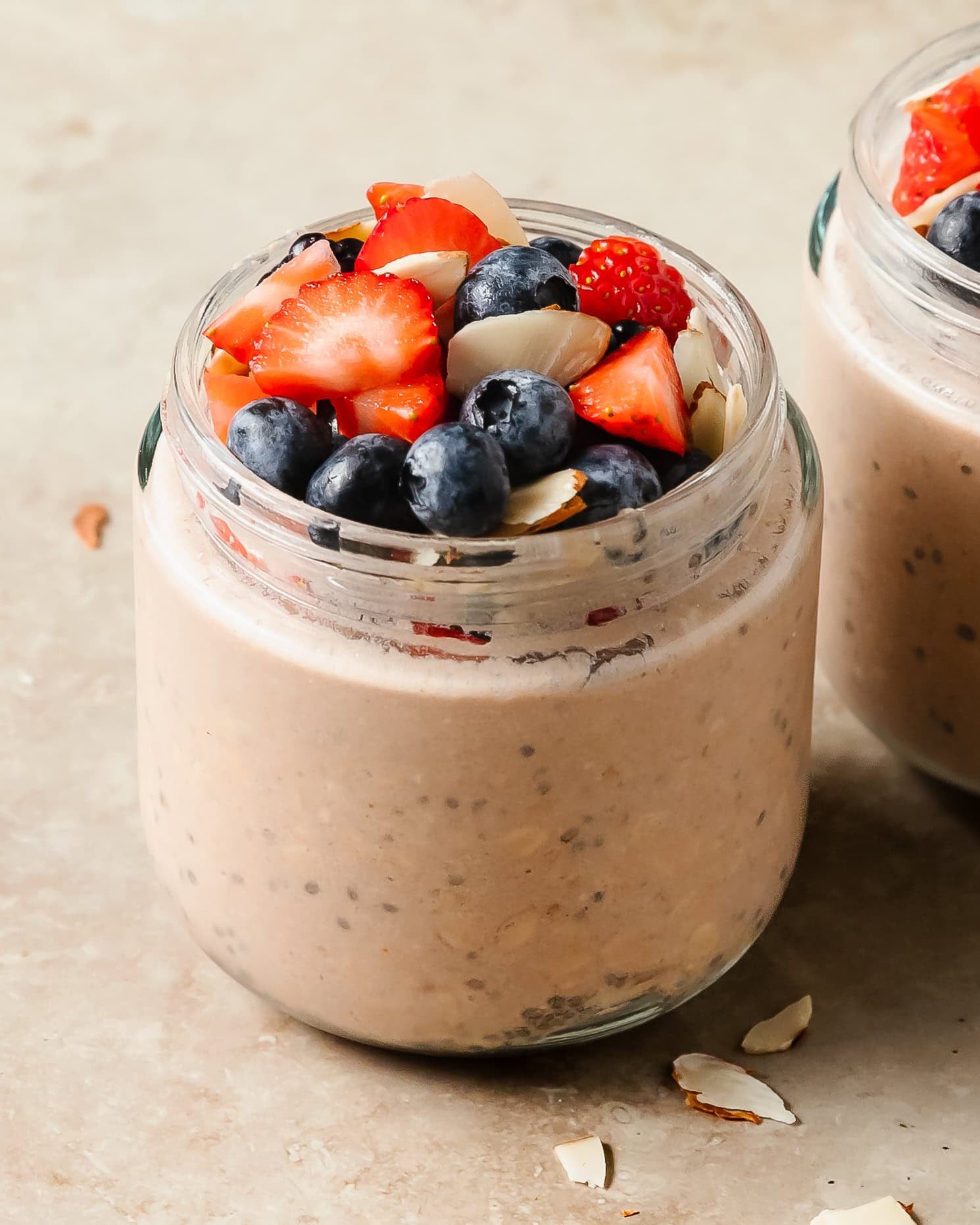 Protein overnight oats is a rich and creamy breakfast made by soaking rolled oats overnight in a sweetened milk and yogurt mixture with a boost of extra protein from a scoop of protein powder. These high protein overnight oats are healthy, hearty and perfect for meal prep.