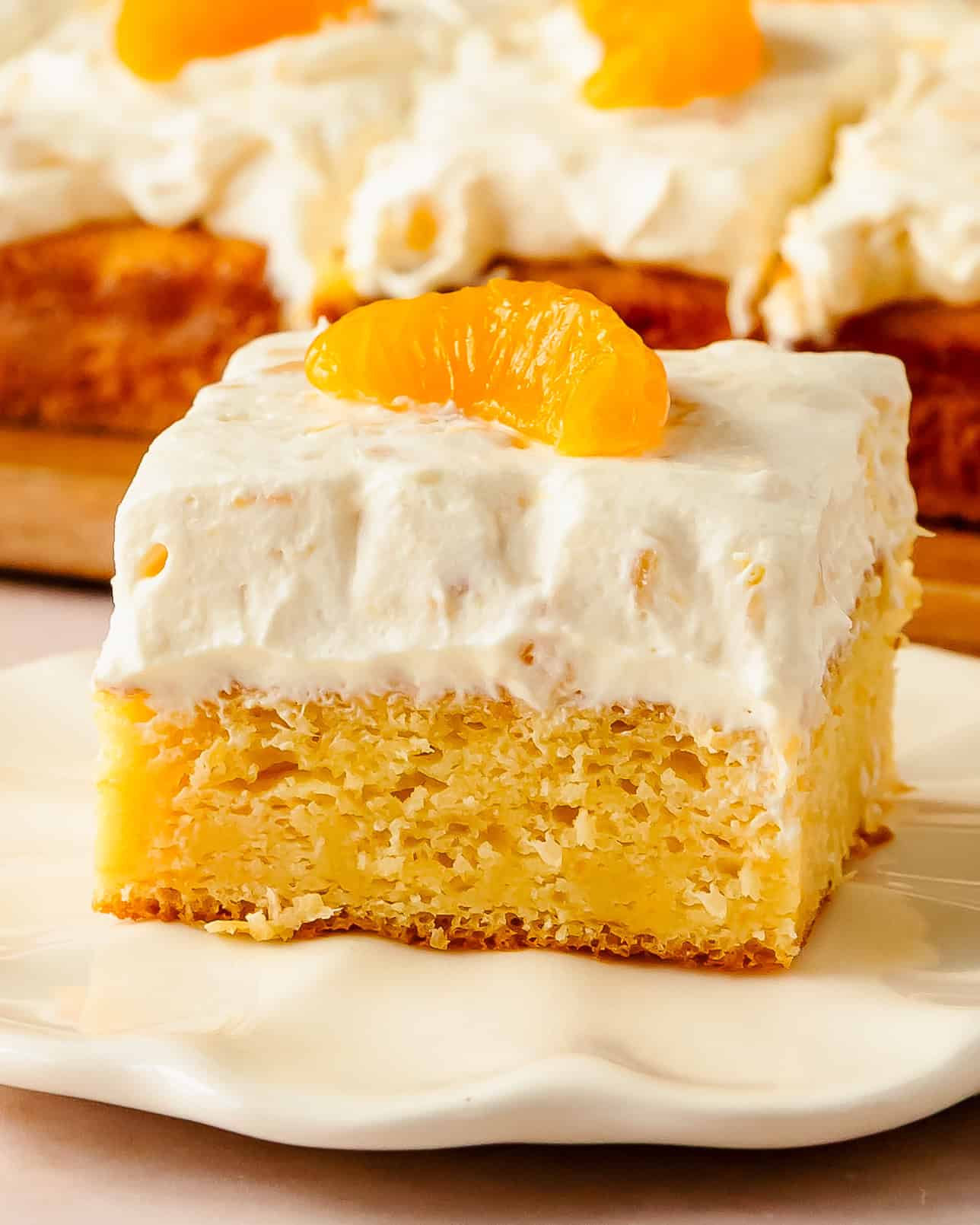 Mandarin orange cake is a soft, tender and moist yellow cake filled with a sweet mandarin oranges topped with a creamy pineapple frosting This mandarin orange cake recipe is quick, easy to make and is the perfect refreshing cake to enjoy all year long.
