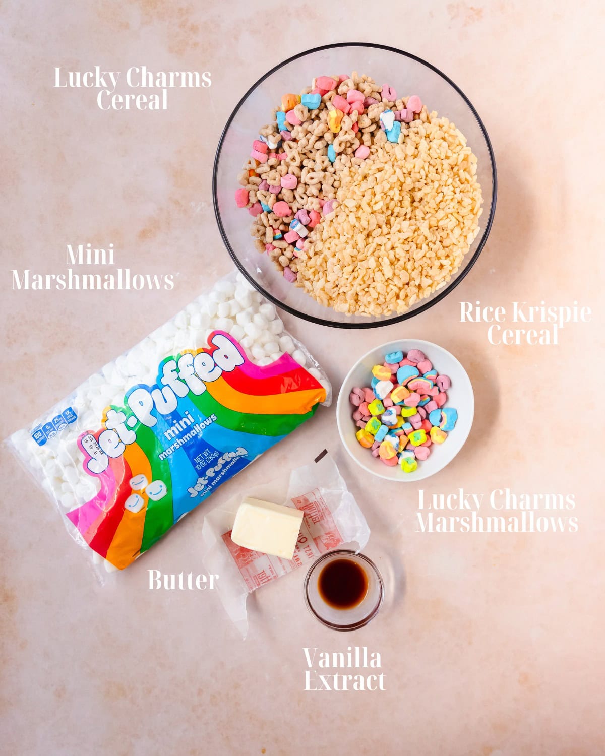 Gather Lucky Charms cereal, Rice Krispie cereal, mini marshmallows, butter, vanilla extract and salt.
