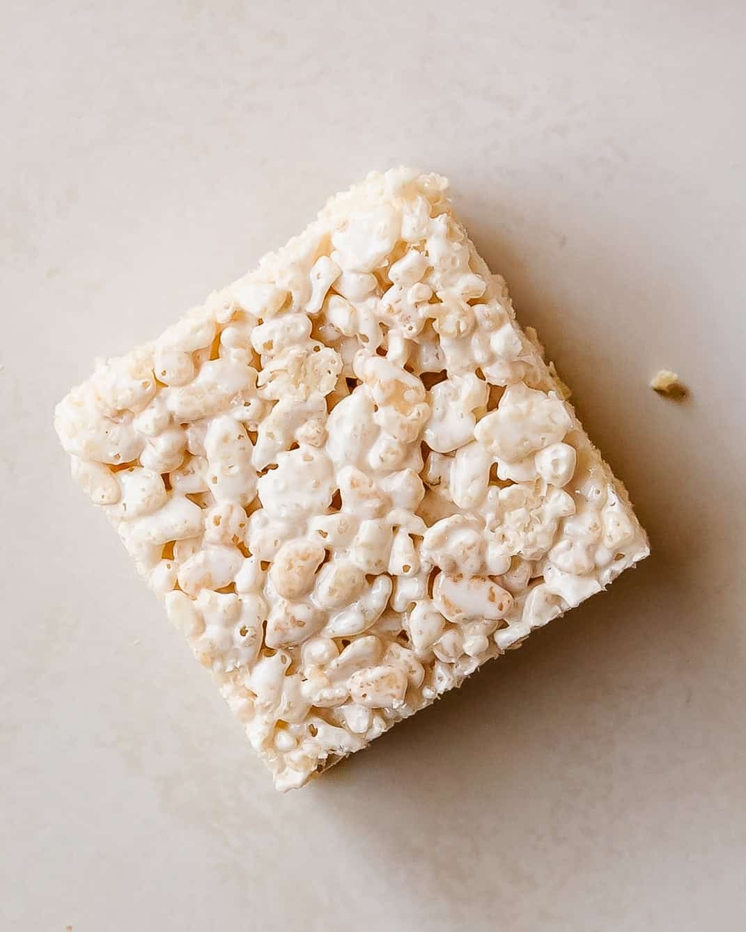 Homemade Rice Krispie bars with marshmallow fluff and crispy cereal.
