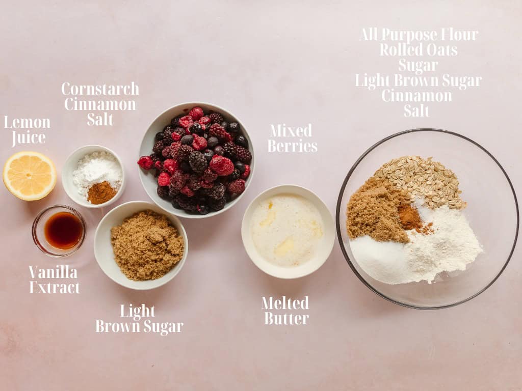 Berry crisp ingredients in bowls.