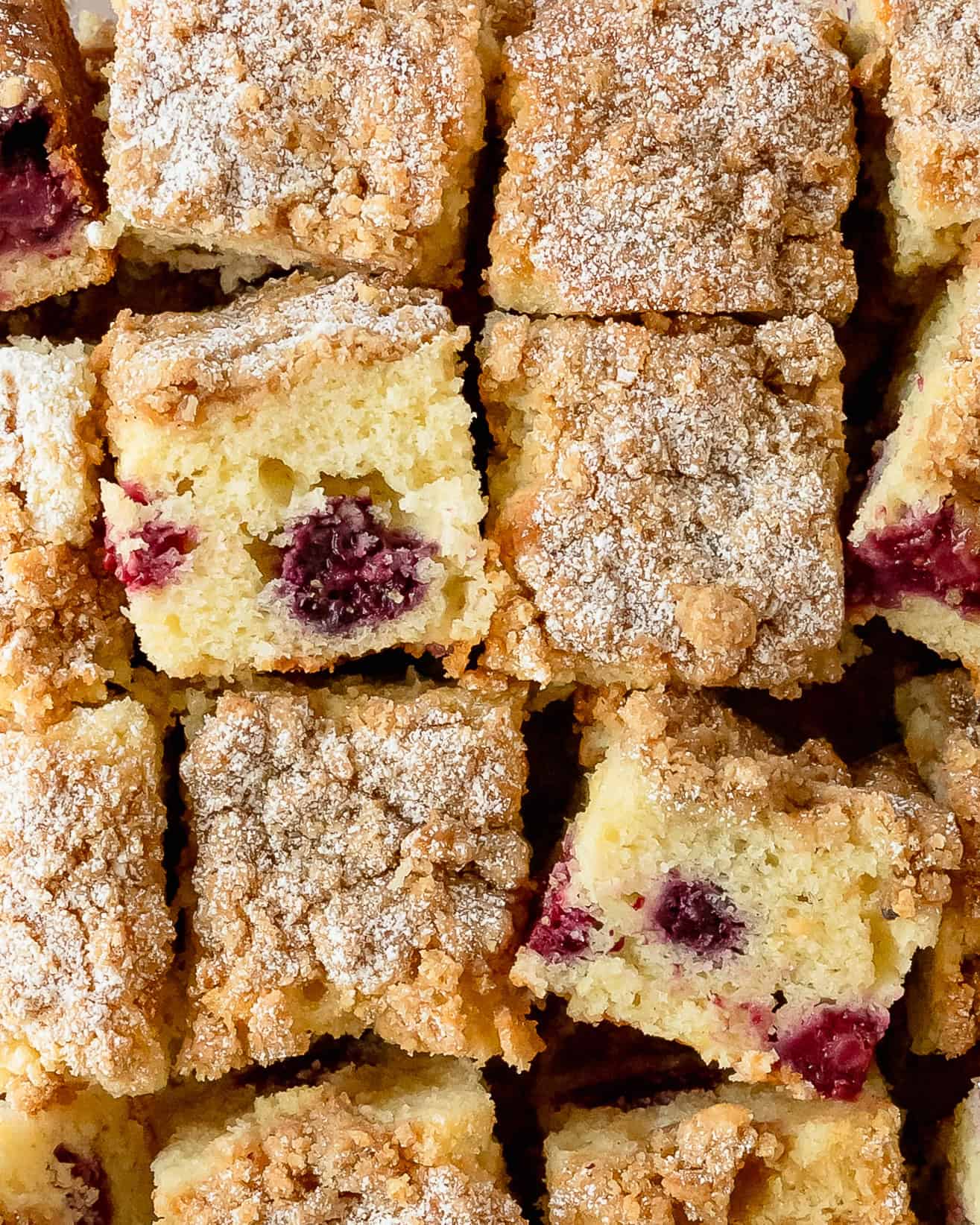 Bakery-style blackberry coffee cake filled with juicy berries and topped with a sweet crumb topping.