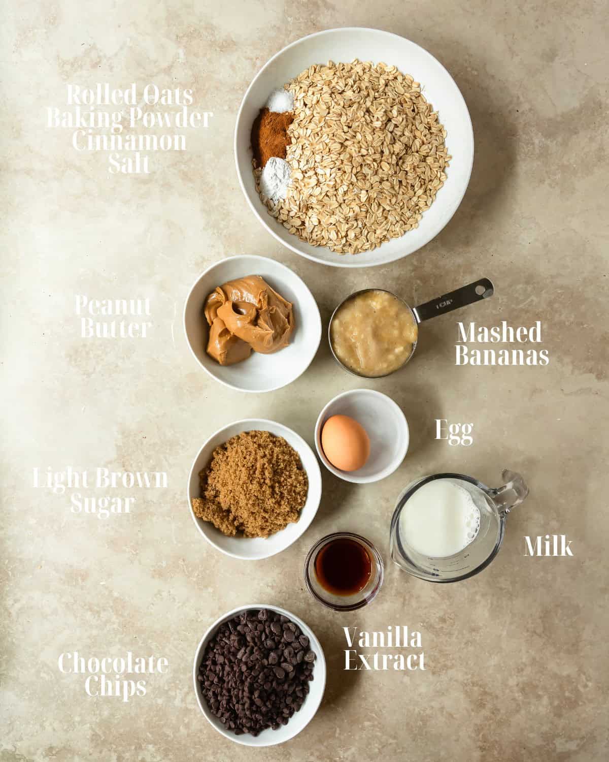 Ingredients for Banana Oatmeal Bars including ripe bananas and rolled oats.