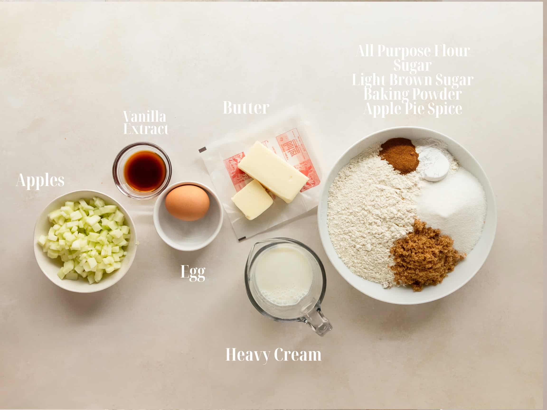 Ingredients to make apple scones in bowls.