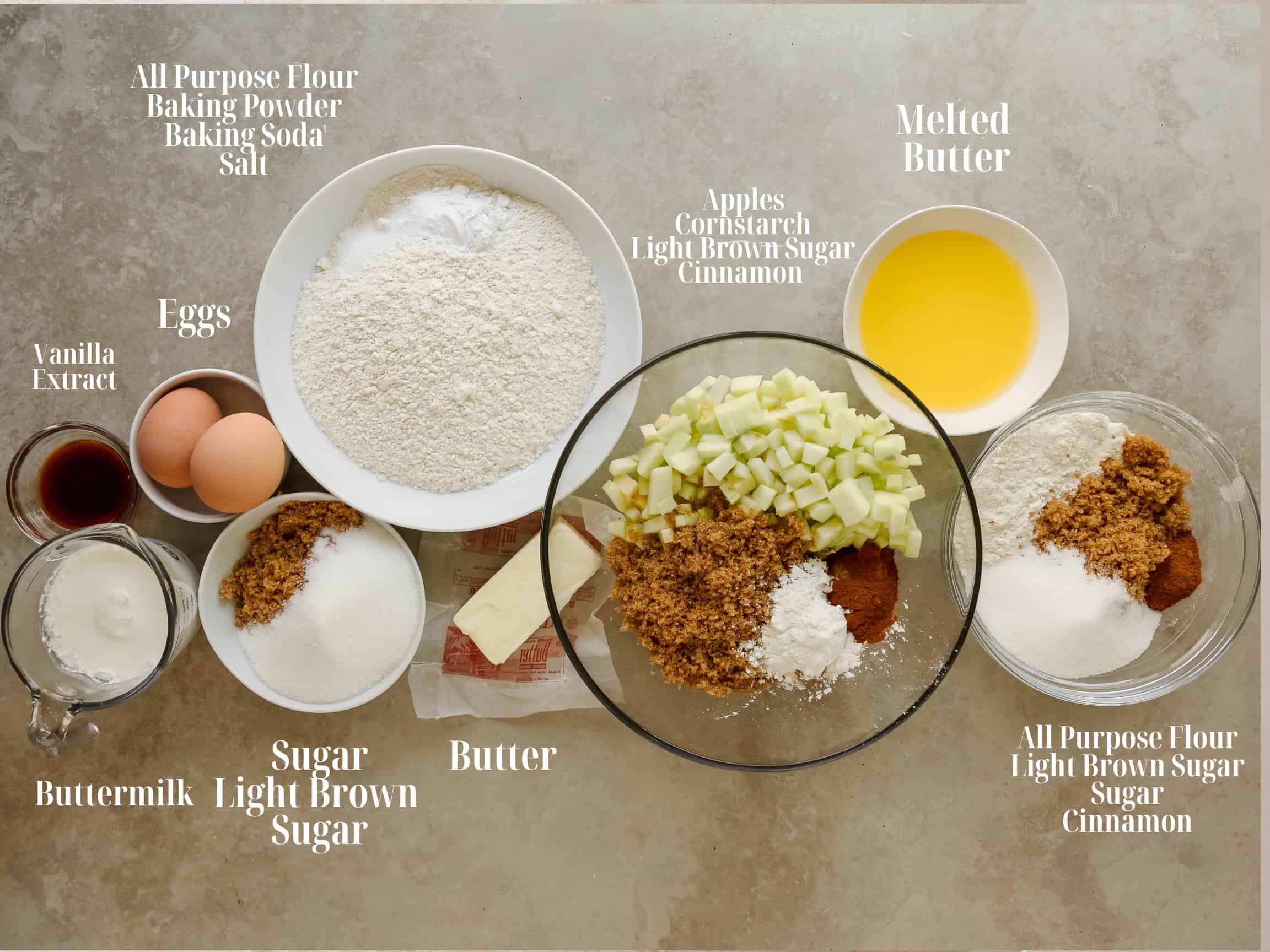 Ingredients to make apple coffee cake in white bowls.